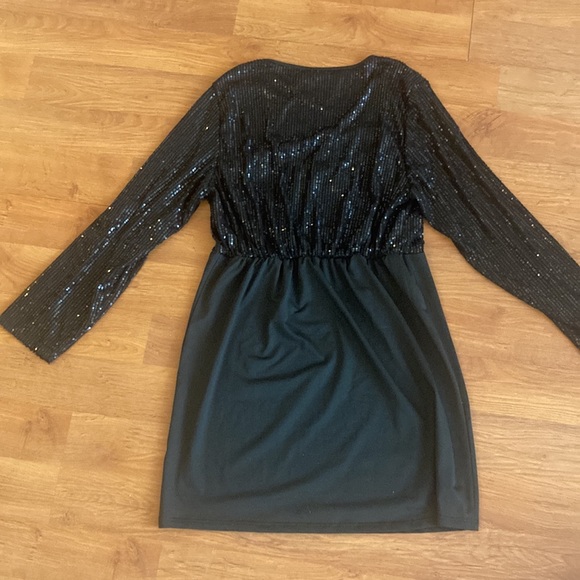 1. Bloom chic gives me a sassy black dress and its cute for plus women size: 14w - Picture 2 of 3